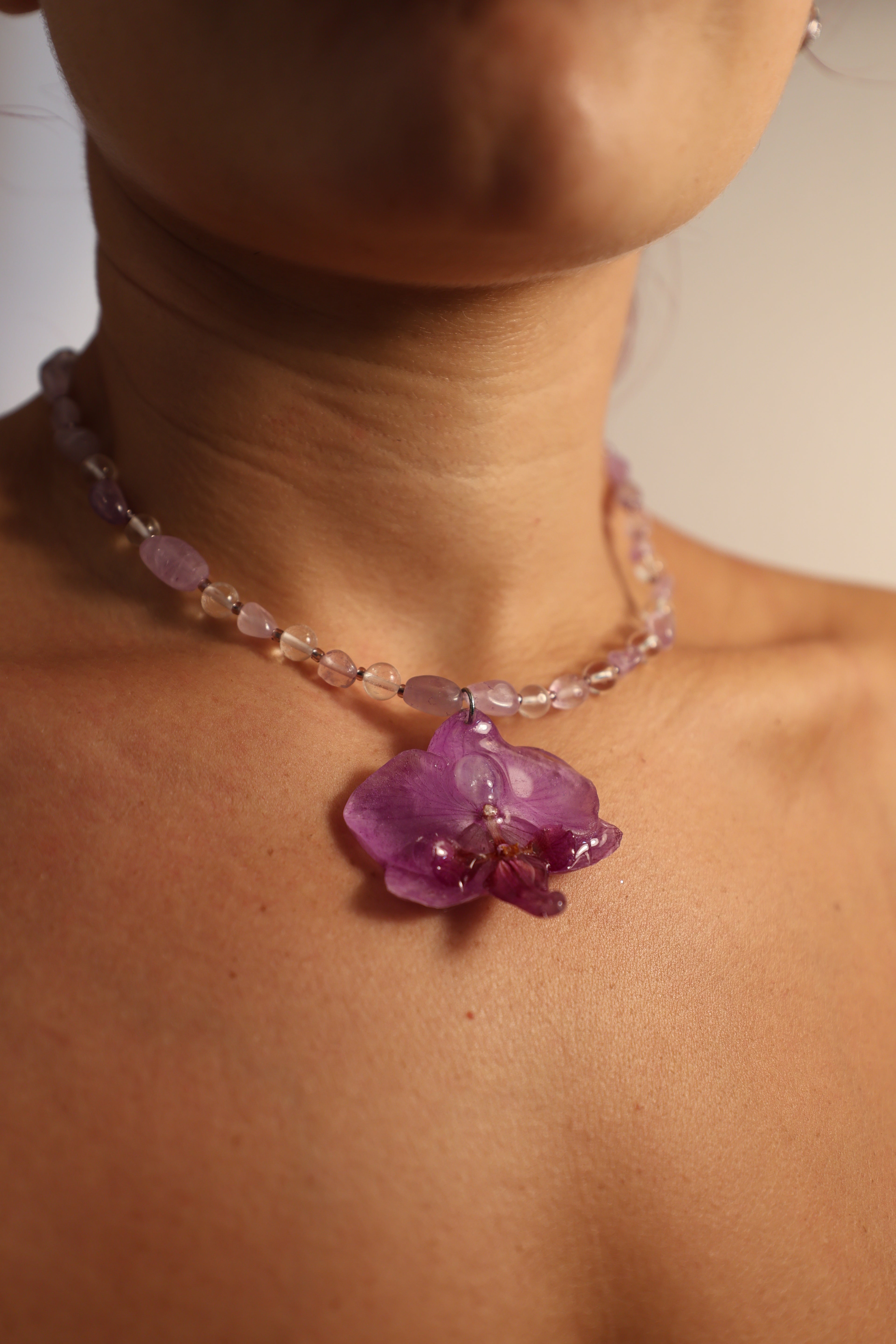 Moonstone orchid with clear quarts and amethyst