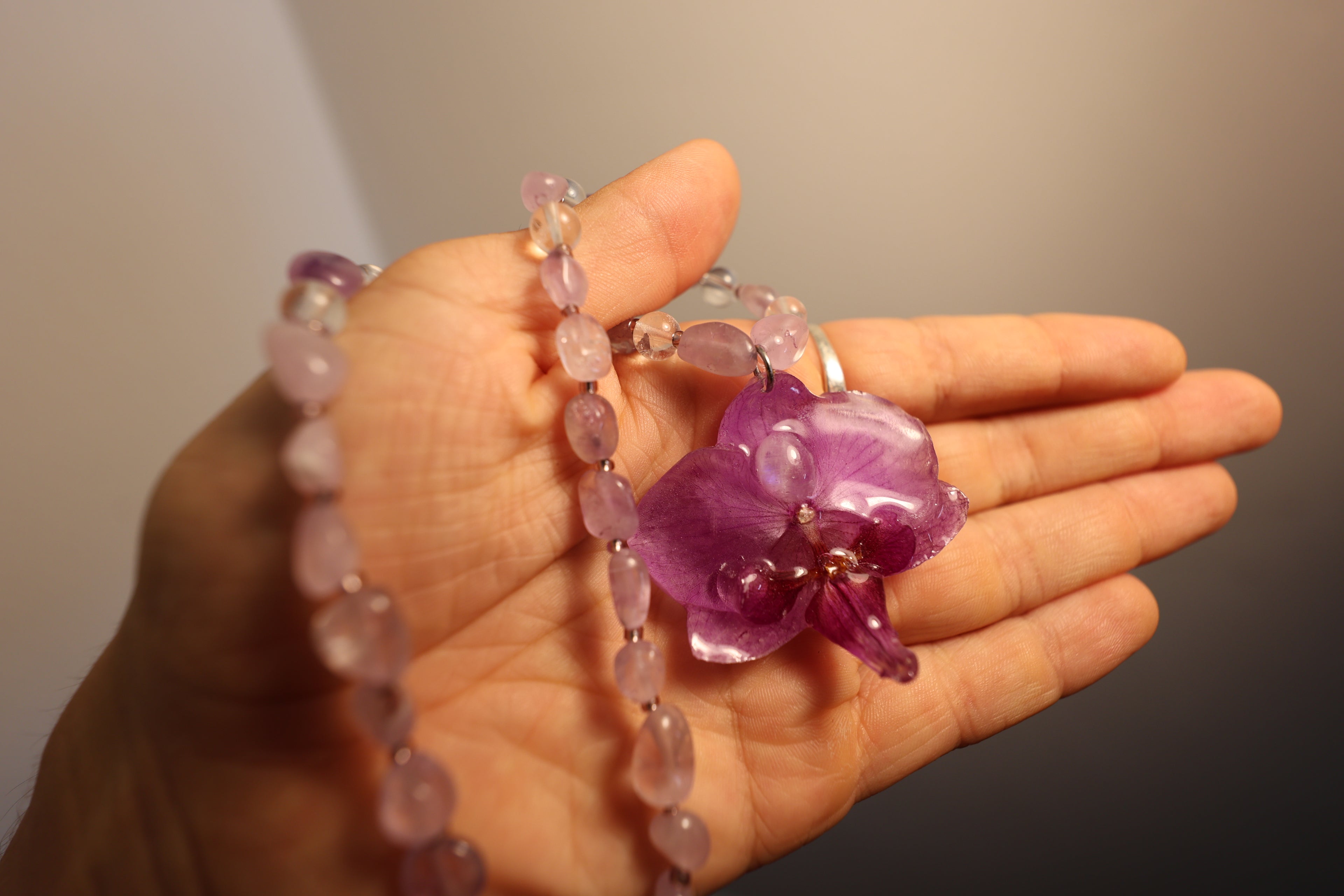 Moonstone orchid with clear quarts and amethyst